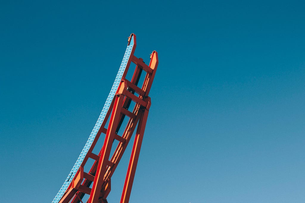 Enigmatic photo of the end of a roller coaster plunging into the void