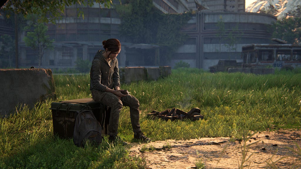 Ellie sitting outside the Hospital in Jackson, with Mel’s tape recorder in her hand.