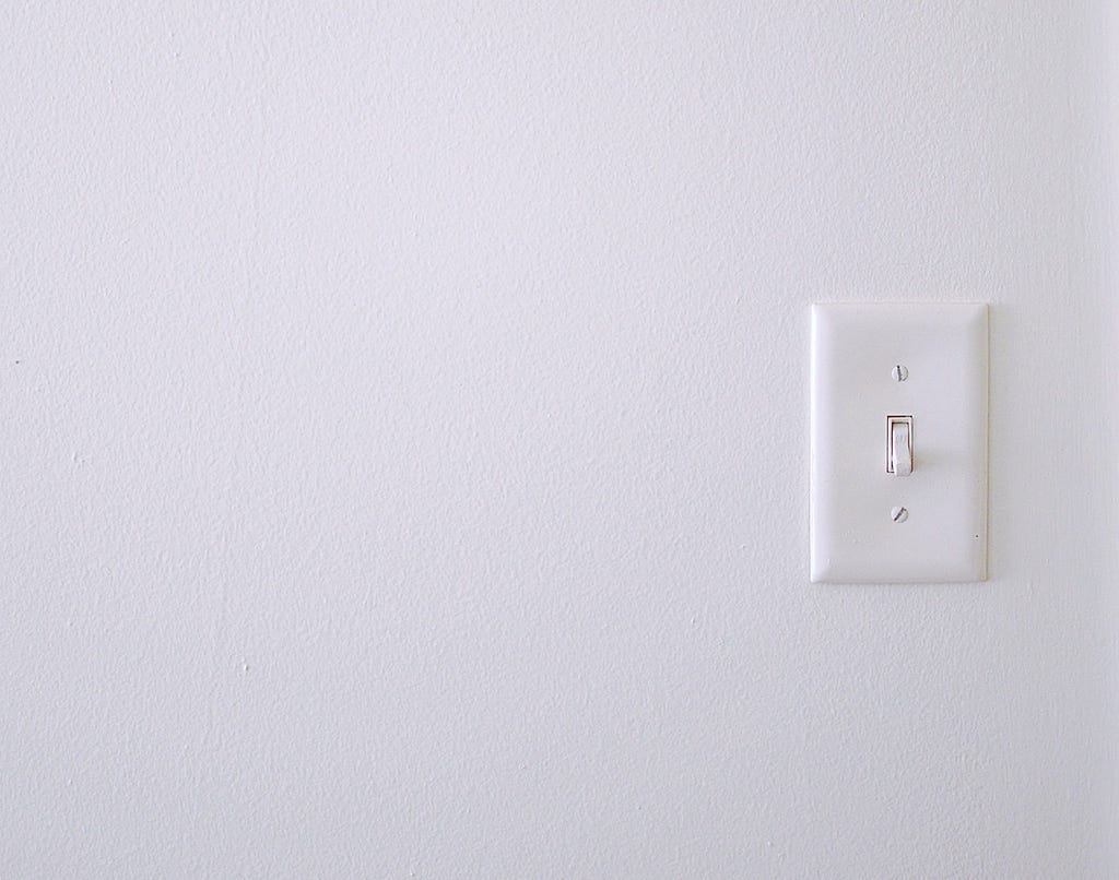 light switch on white wall