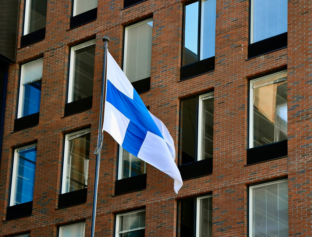 Finland flag in front of a building