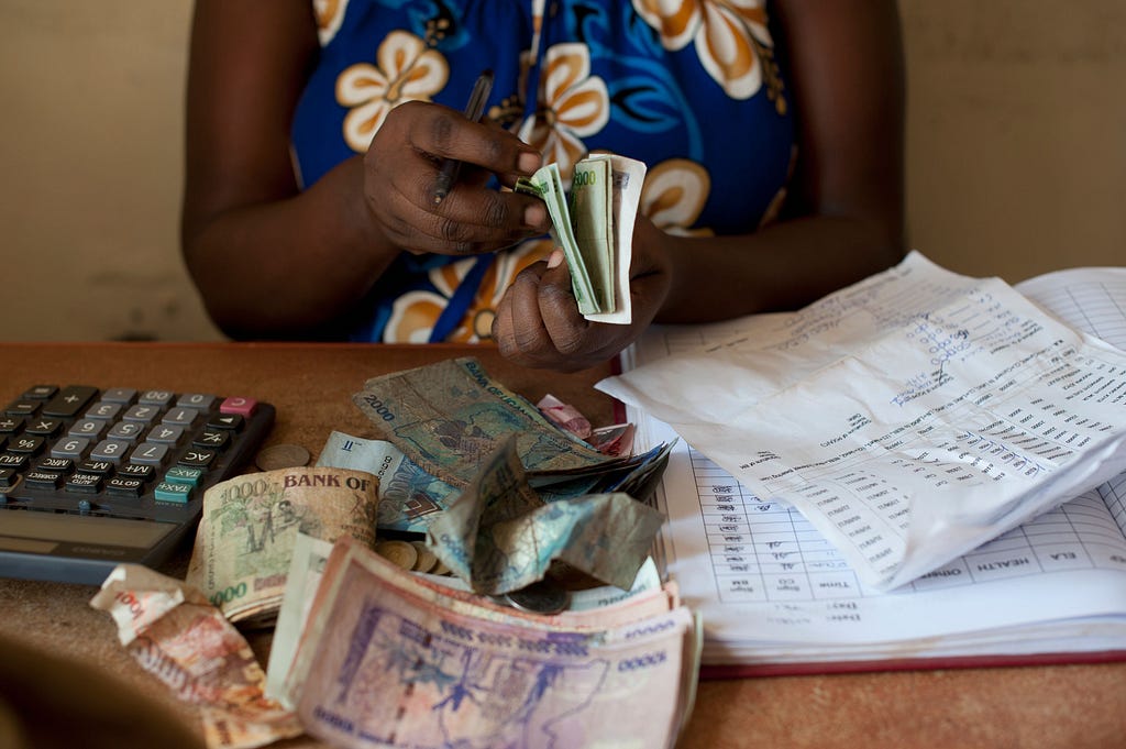 A lady counting her finances