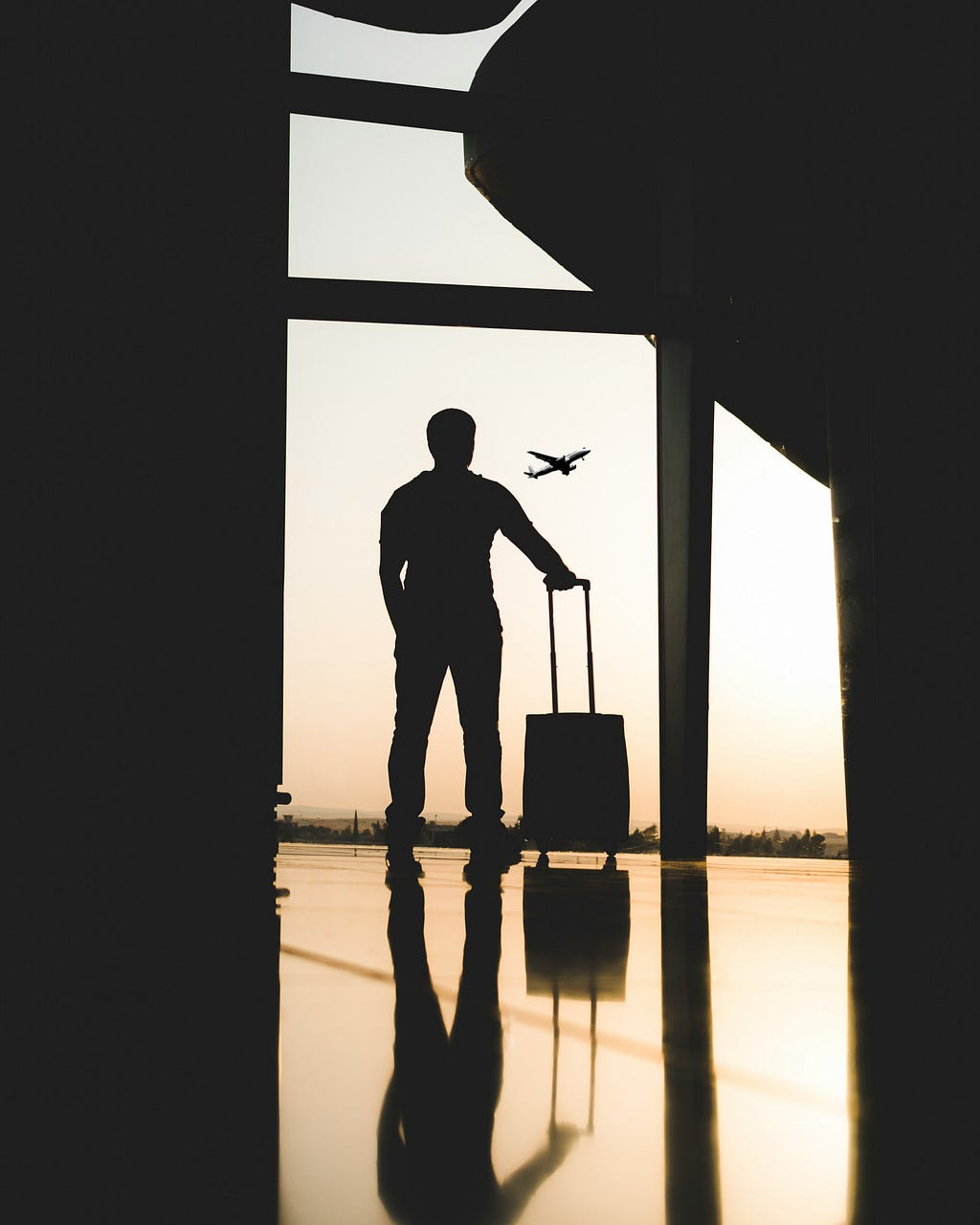 man waiting at the airport- shadows