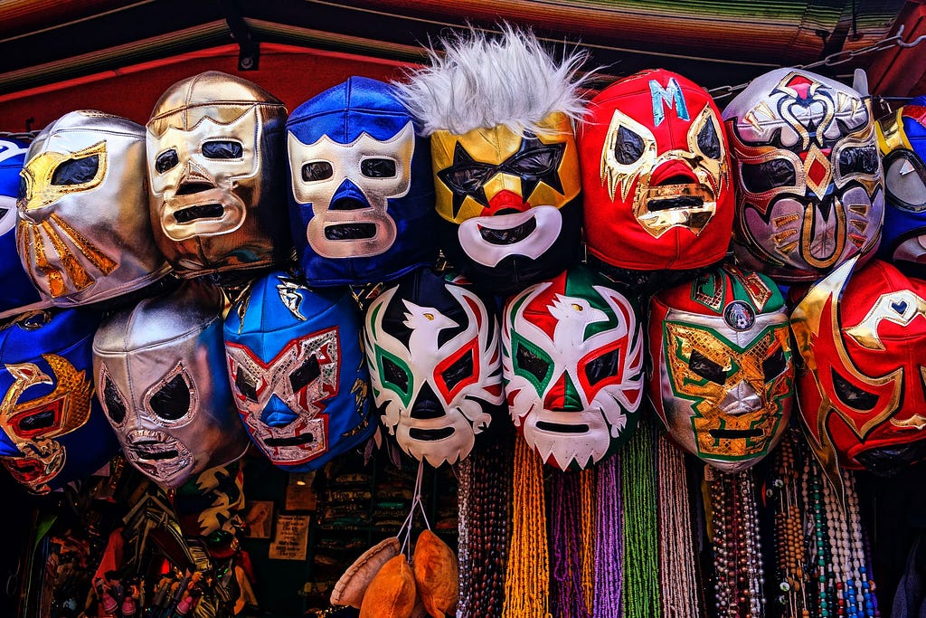 Colourful wrestling masks for sale at a market