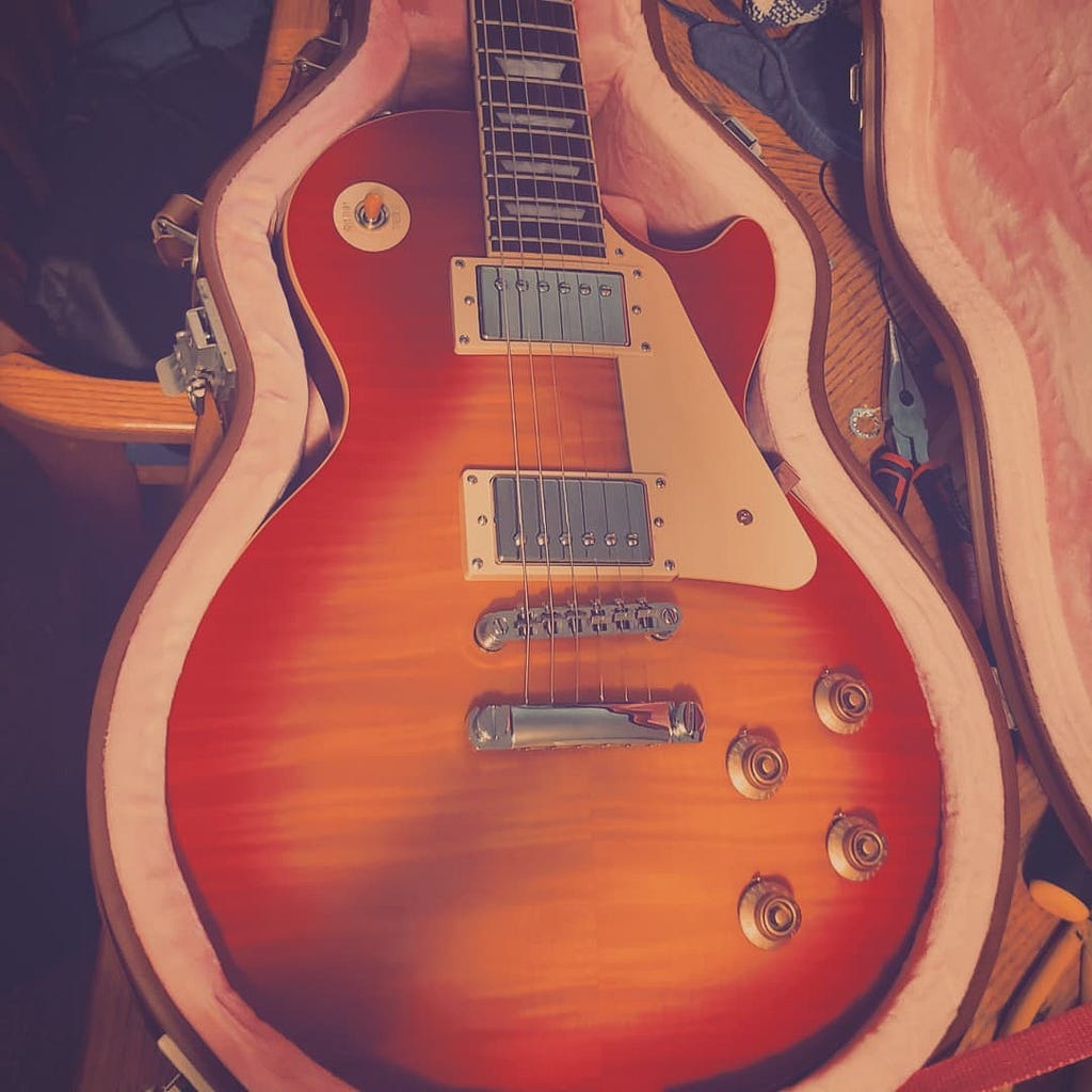 Les Paul resting in a case