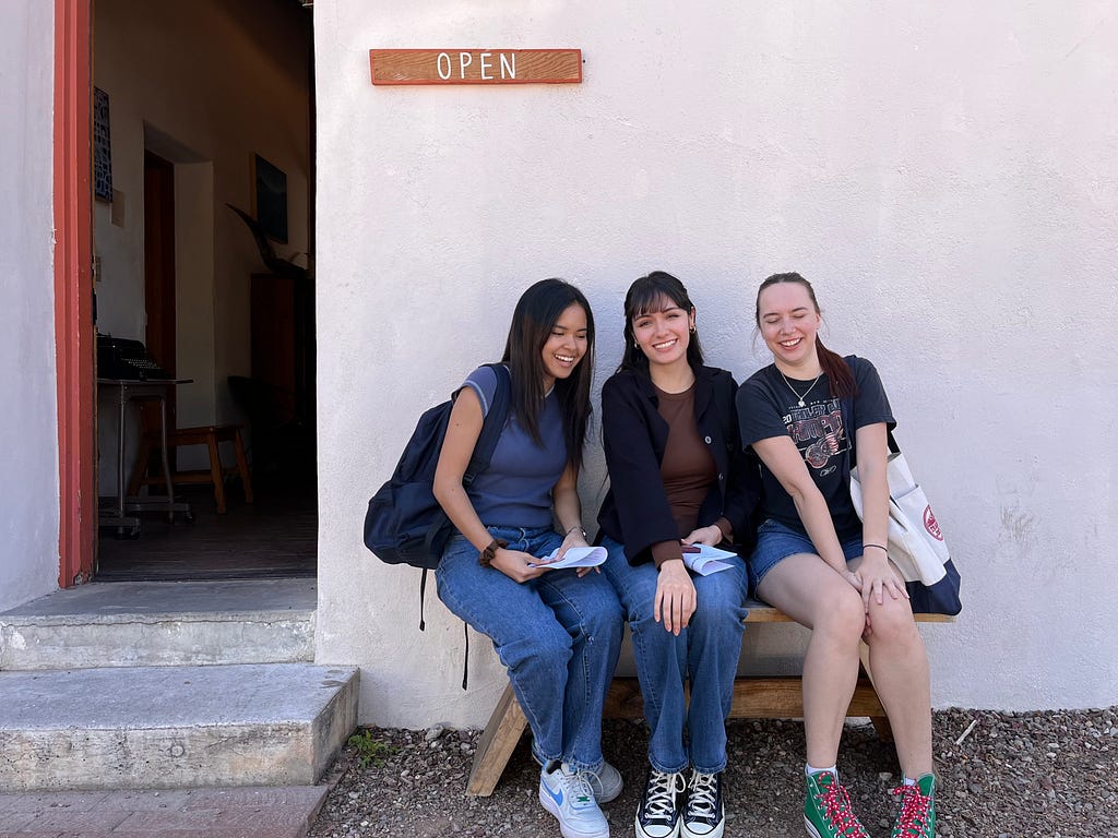 Three UX team members meeting in Tucson.