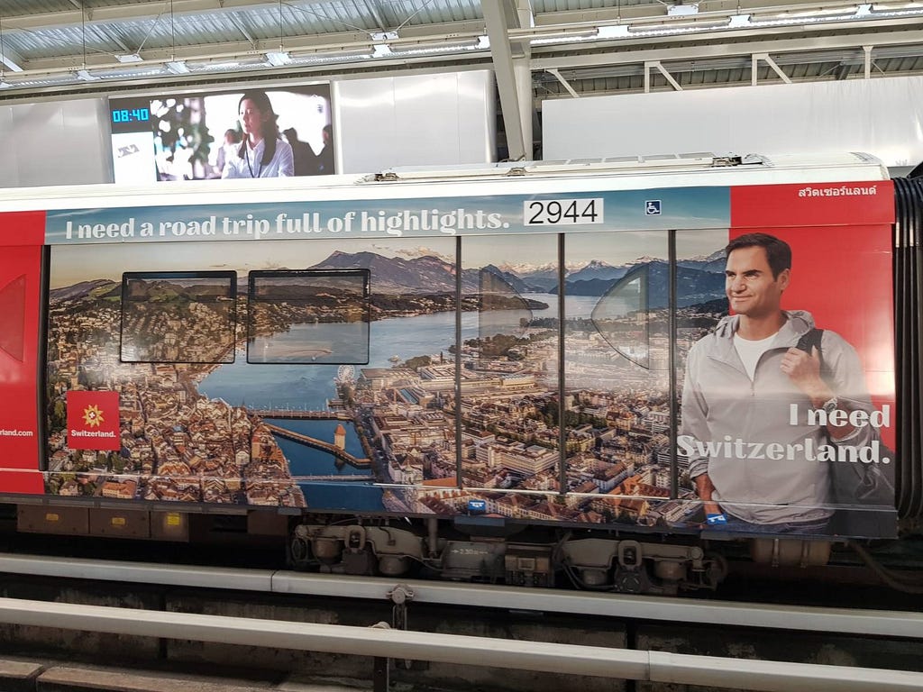 Switzerland ad with Roger Federer on the Skytrain