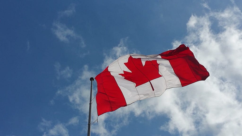 The image shows the flag of Canada.