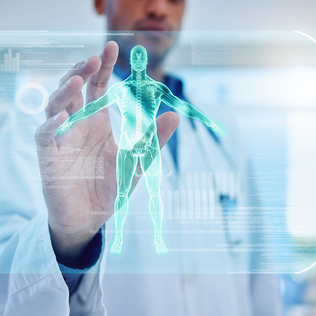 A doctor interacts with a holographic image of a human body, symbolizing advanced medical technology and the integration of digital tools in healthcare for better diagnosis and treatment.