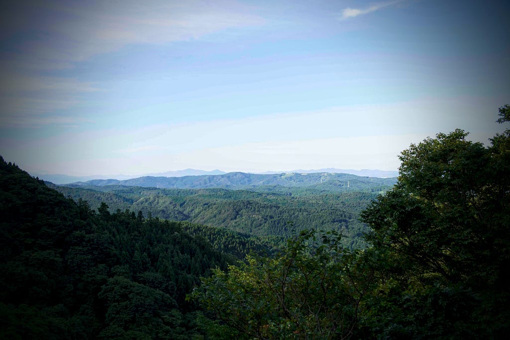 A mountain range under a blue sky seen from Mt. Kyogakura in Sakata City, Yamagata Prefecture, North Japan.