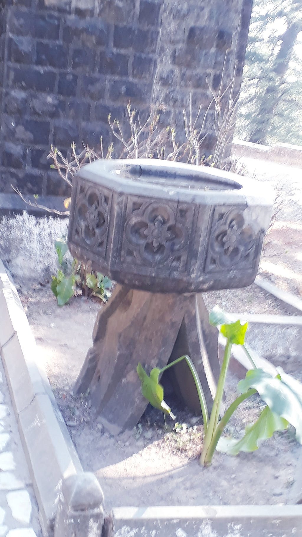A stone baptismal font: Himachal Pradesh