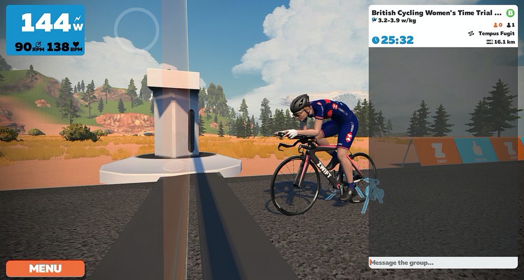 Warming up at the beginning of a TT a screen cap shows a vritual racer on a virtual TT bike at a startline, on a virtual static trainer.