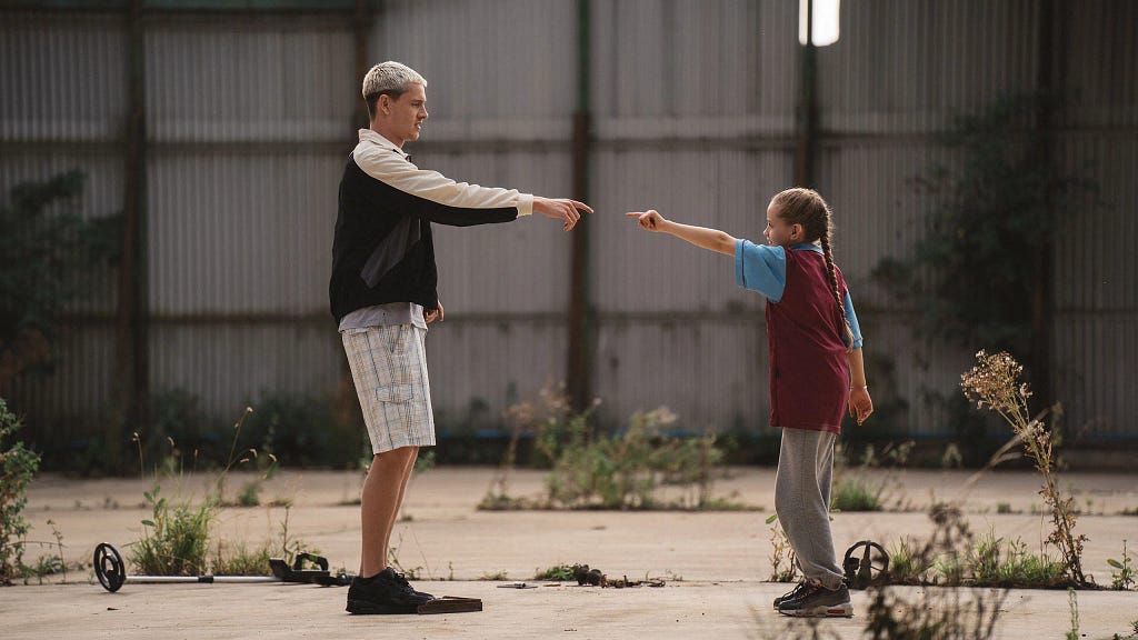 Still of a father and his young daughter in Scrapper, directed by Charlotte Regan.