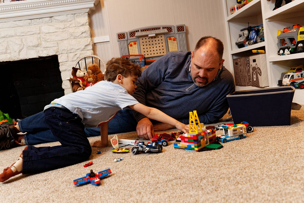 Michigan Senate Minority Leader Jim Ananich plays with his son Jake, 4, at home in Flint. Photographed by M. Scott Mahaskey \ POLITICO
