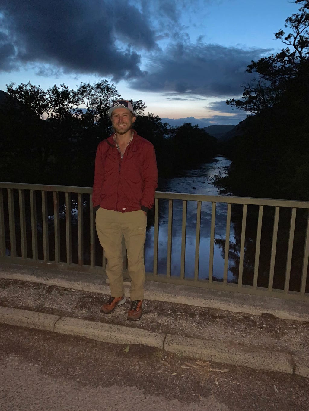 The author standing on a bridge at dusk.