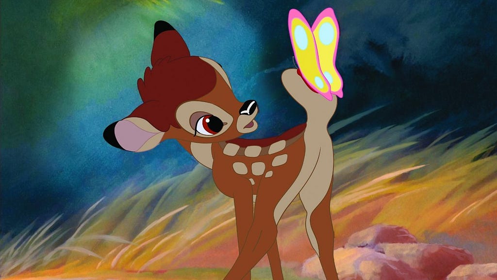 A still frame of Bambi, looking very endearing, from the Walt Disney film
