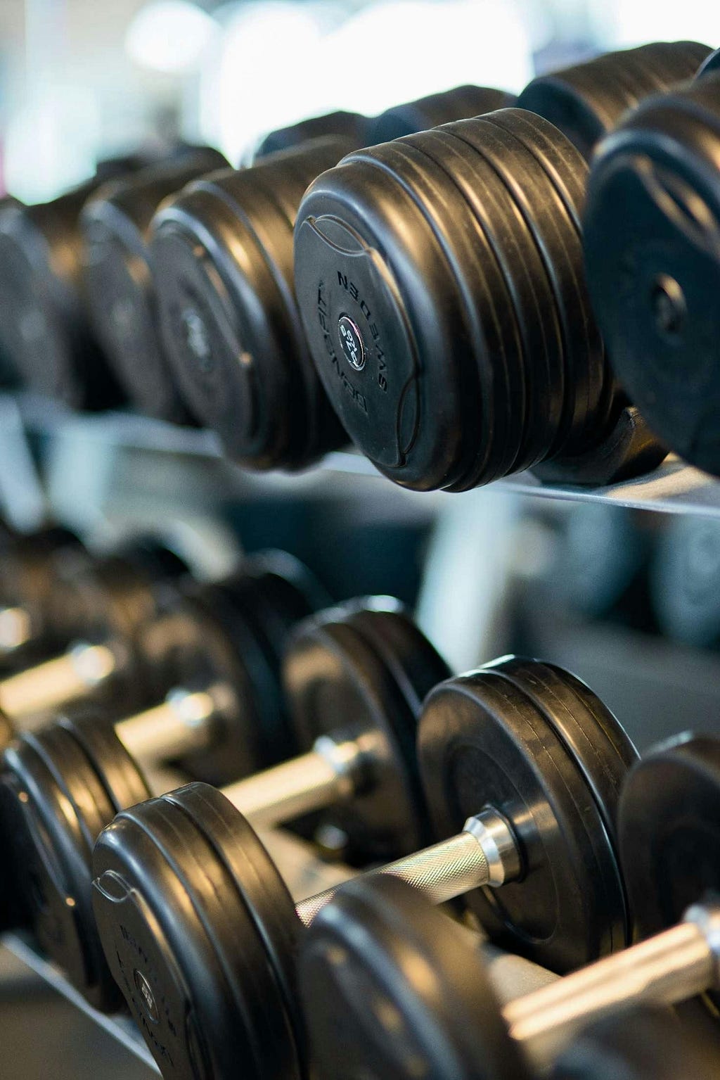 Photo by Pixabay: https://www.pexels.com/photo/black-dumbbell-lot-260352/