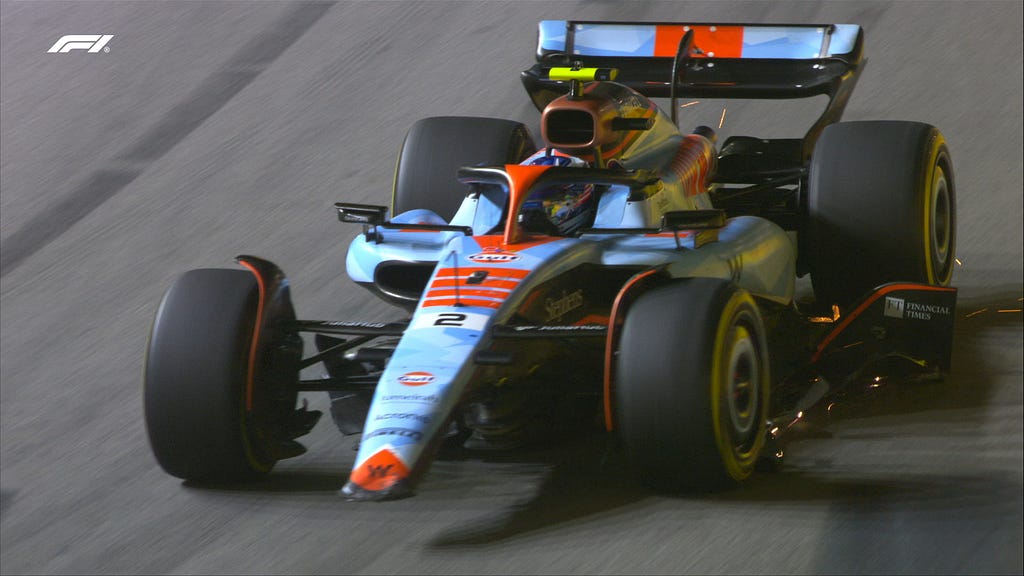 Logan Sargent going towards the pitlane with lingering front wing in Marina Bay, Singapore GP 2023