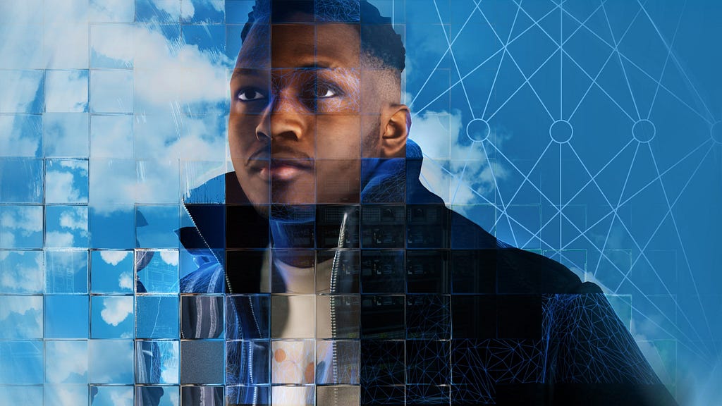 This image shows a young black man wearing a black coat staring past the camera in front of a blue cloudy sky. The scene is refracted in different ways by a fragmented glass grid. This grid is a visual metaphor for the way that new artificial intelligence (AI) and machine learning technologies can be used to extract and analyse behavioural and demographic data in innovative ways.
