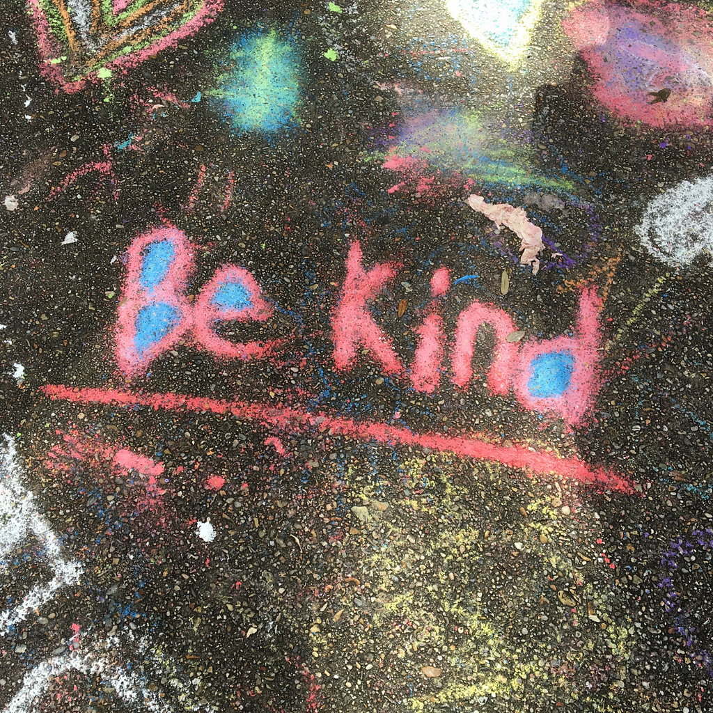 Chalk written sign saying ‘Be Kind’