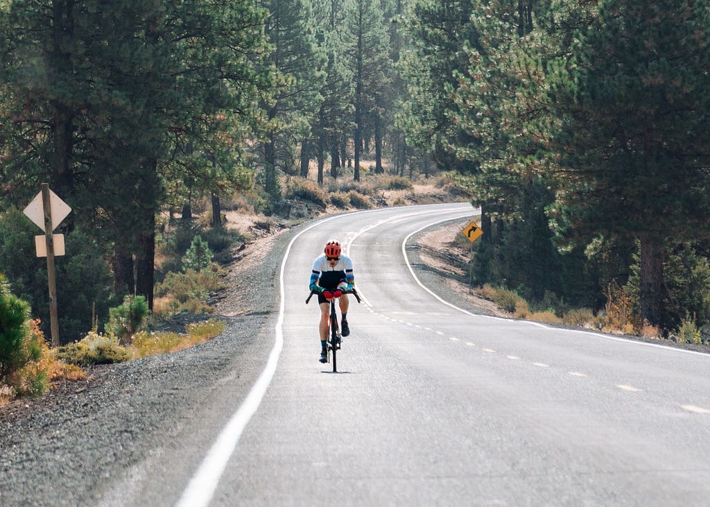 Aero tuck bike riding on the highway