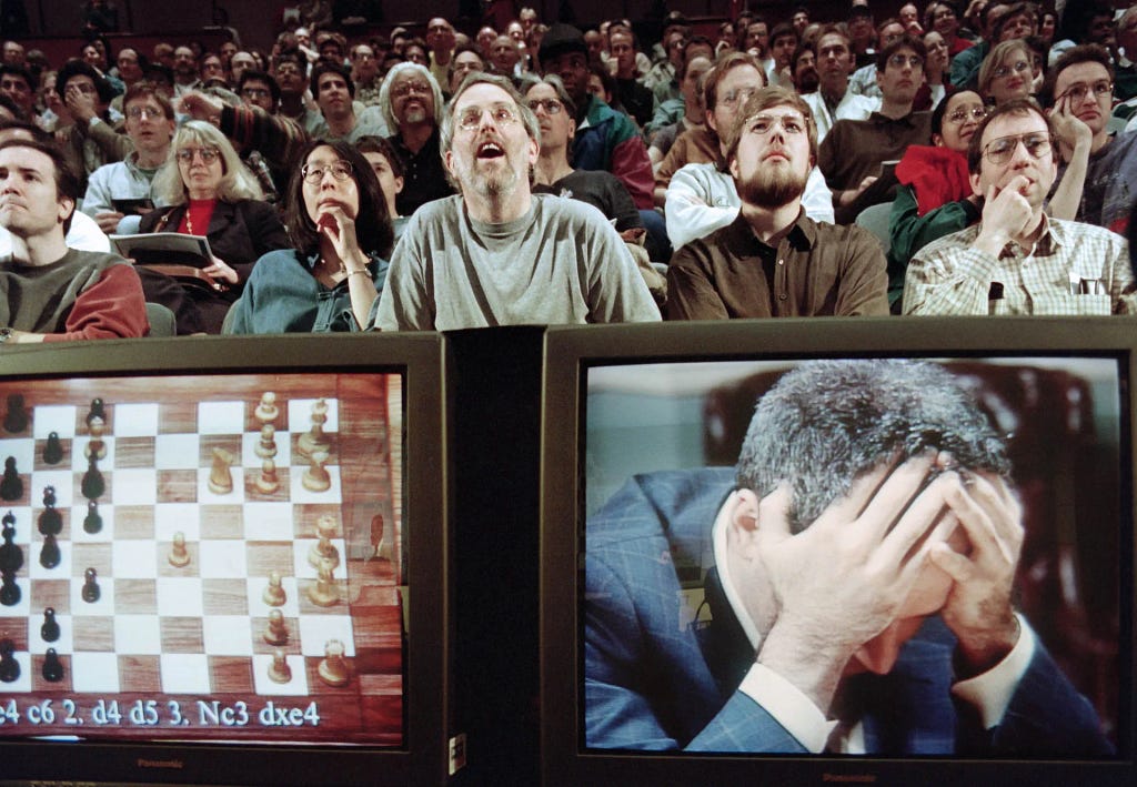 The famous picture of Garry Kasparov losing to a computer.