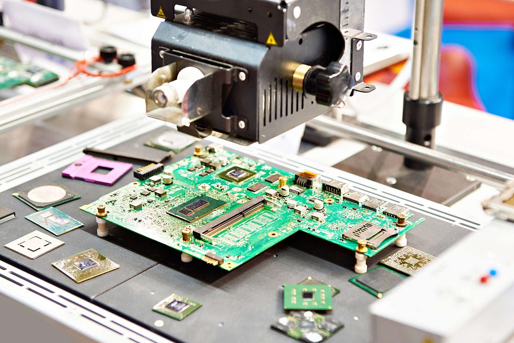 Electronics are being manufactured at a factory.