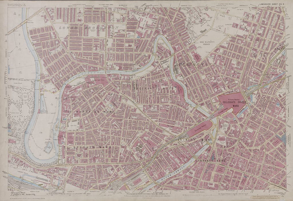 Detailed Ordnance Survey map of Manchester from 1892 featuring the city centre, Victoria Station and the River Irwell.