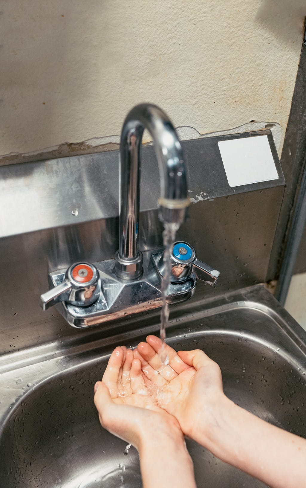 Person washing their hands