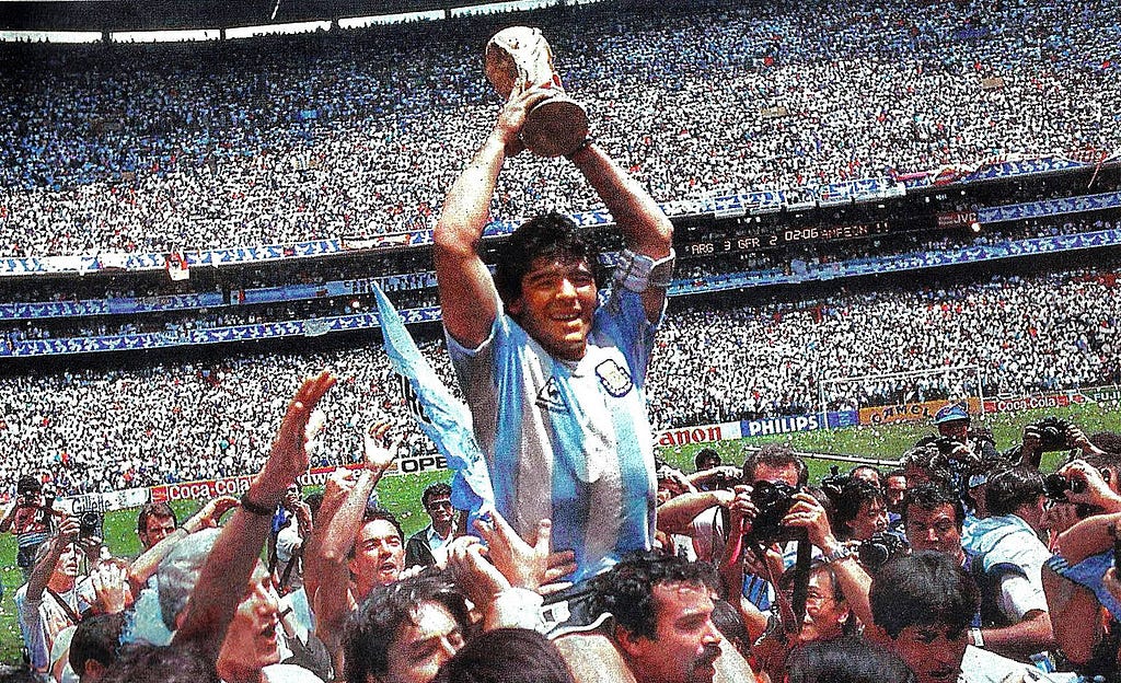 Photo of Diego Maradona lifting the 1986 World Cup trophy