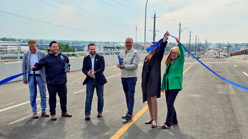 Cutting the ribbon at the 50th Street Overpass opening
