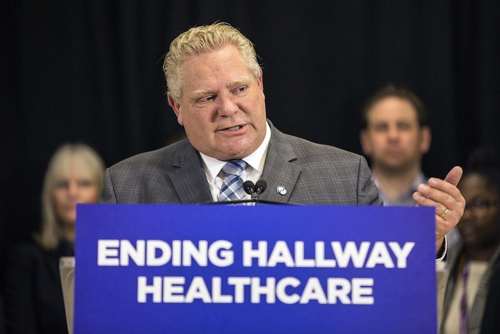 Doug Ford, the man against UBI, pushing for “ending hallway healthcare.”