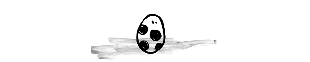 A rock disguised as a spotted egg.