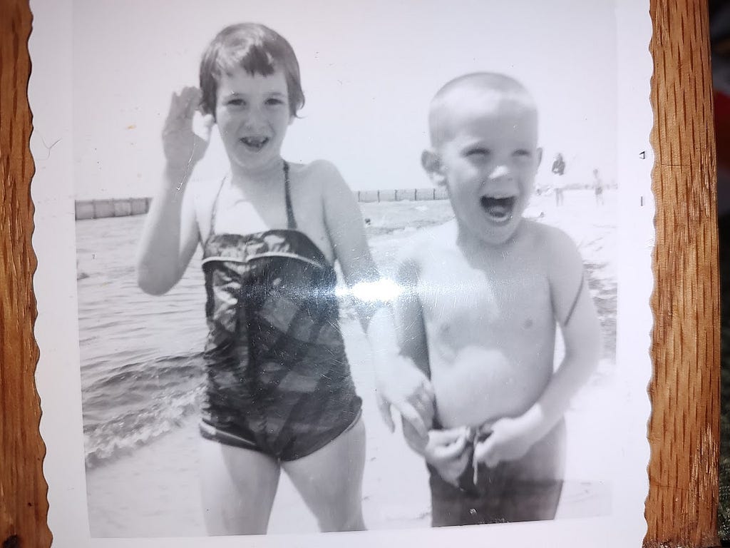 a picture of my brother and me at our town beach, around 1960