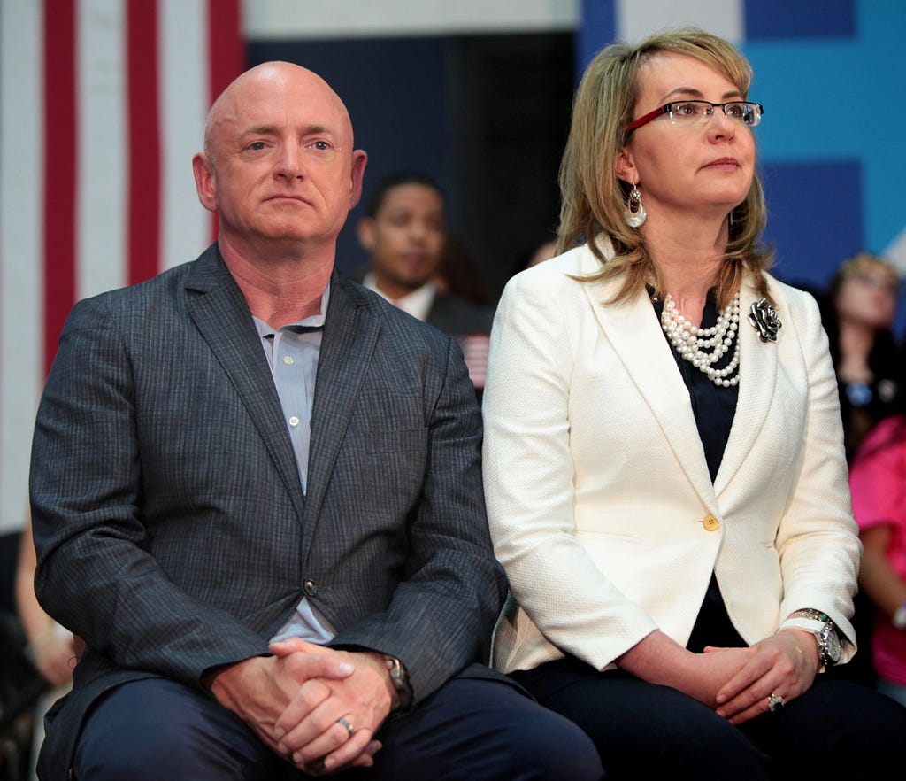 Mark Kelly and Gabby Giffords sitting together