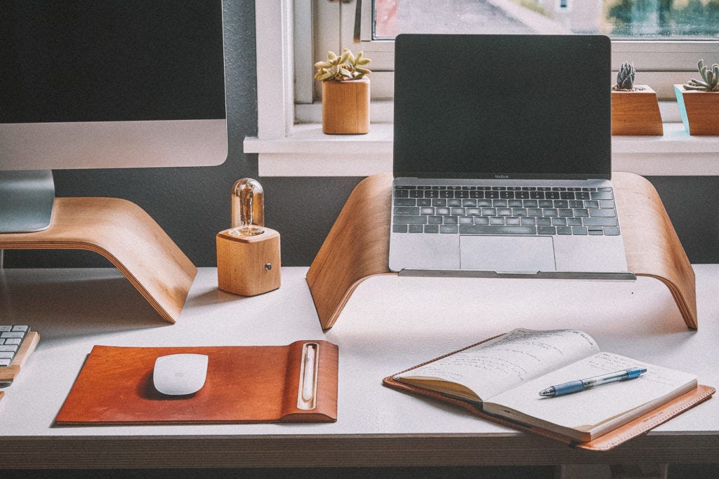 Laptops and notebook on a desk