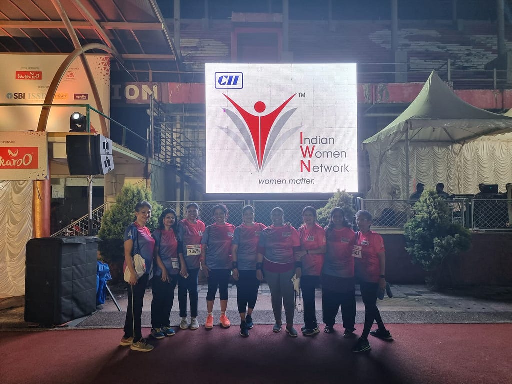 Women gather at night for the run at the venue