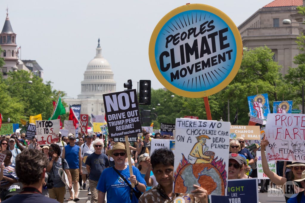 Protestors gather in 2017 protesting the Trump Administration’s climate policies.