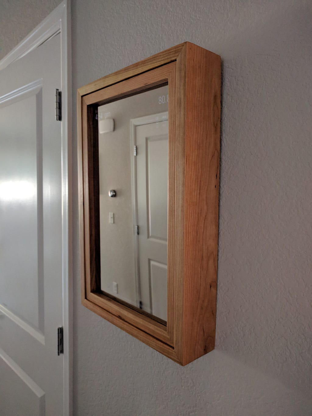 mirror mounted to wall