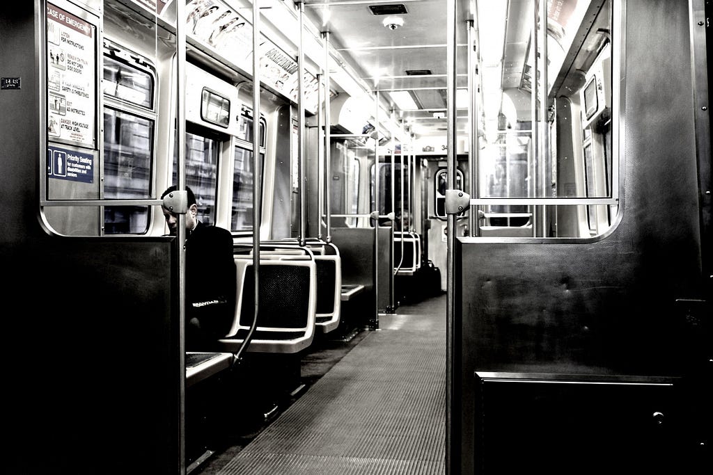 Man alone on train.