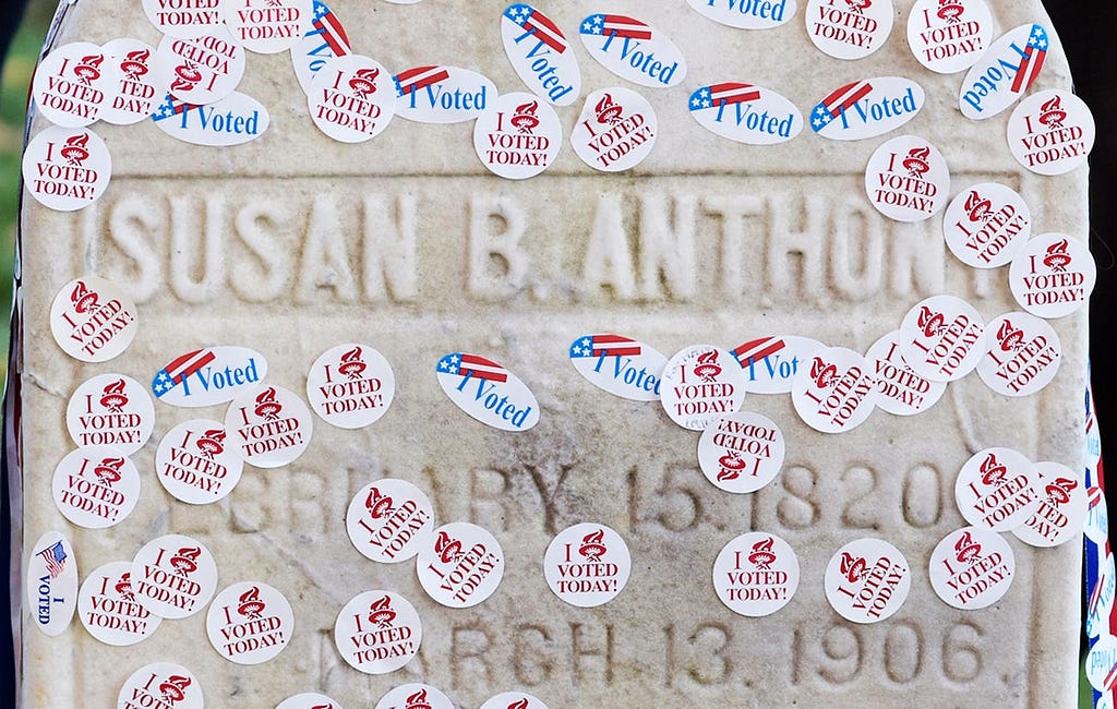 The grave of women’s suffrage leader Susan B. Anthony covered with “I Voted” stickers.