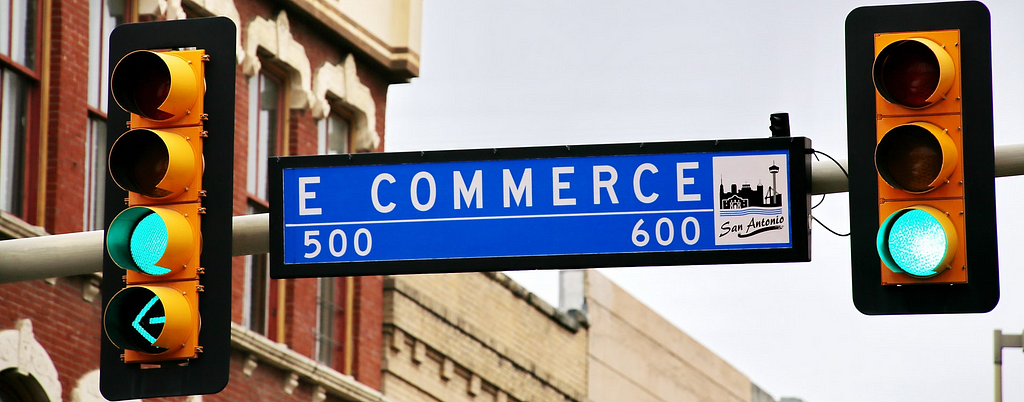 Photograph of E Commerce avenue traffic sign, courtesy Mark König on Unsplash