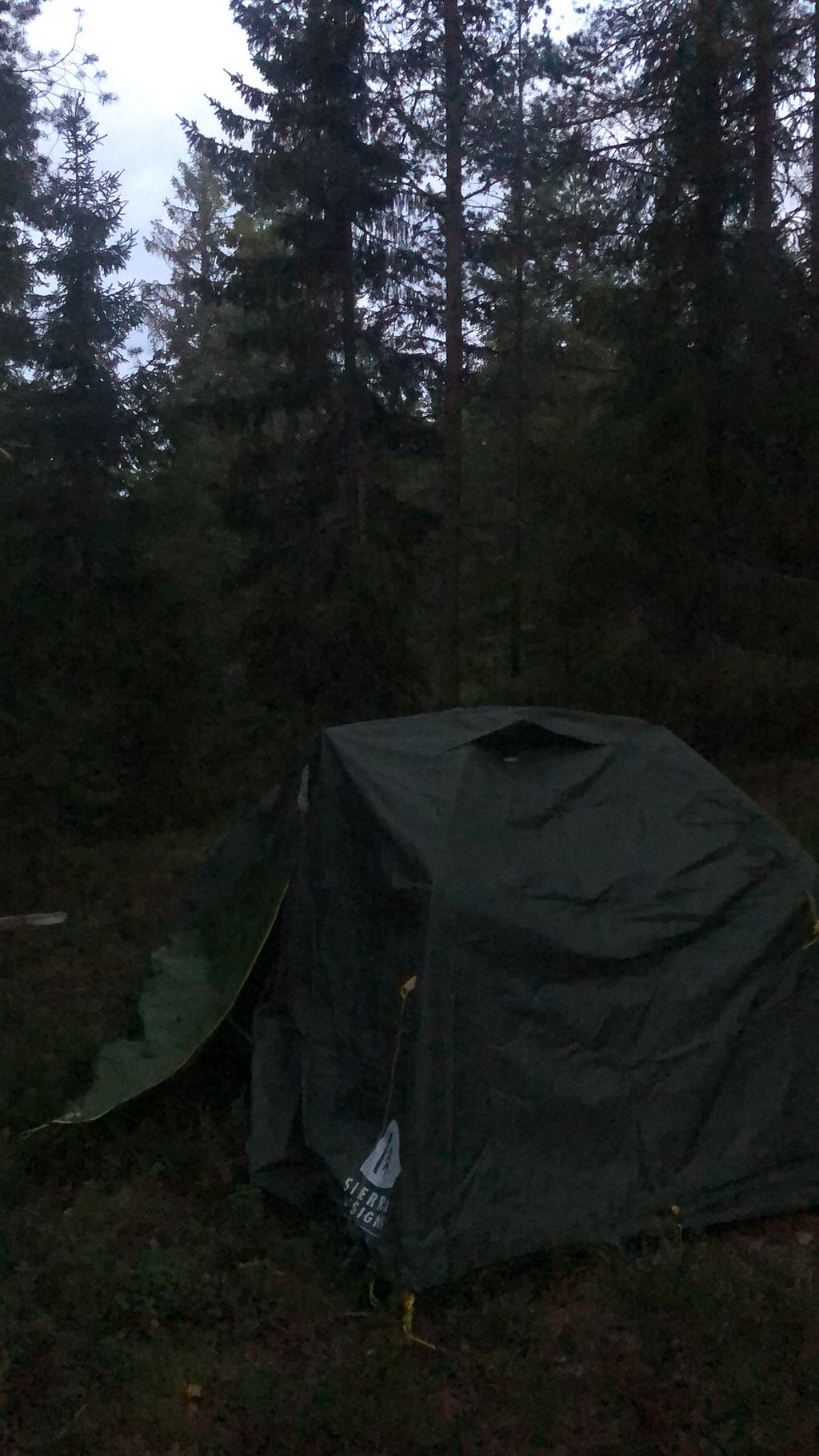 A tent in the dark woods of Norway