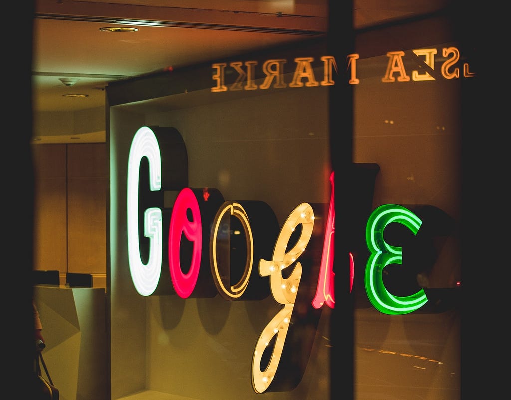Photo of Google logo in an office