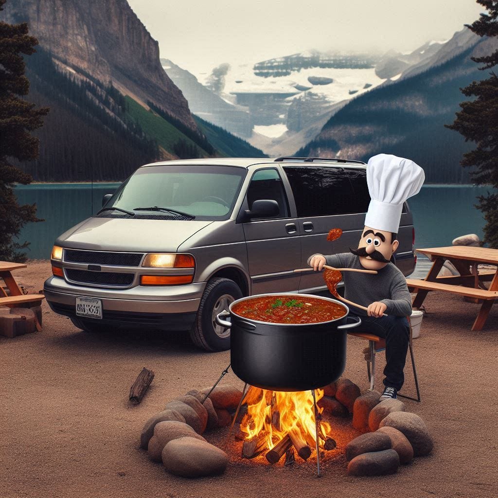 a minivan camper, at a campsite with a man making a big lunch