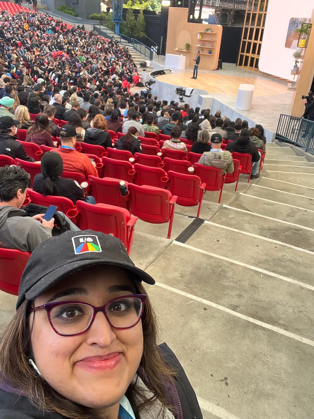 A selfie of me in the amphitheatre with Sundar Pichai on stage