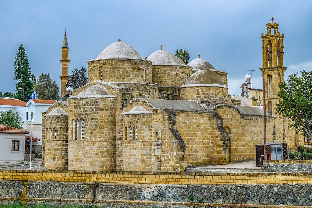 A Byzantine era church in Cyprus. Note the four visible domes of the cross shape as well as the three semidomes over the apses. Image by Dimitris Vetsikas from Pixabay.