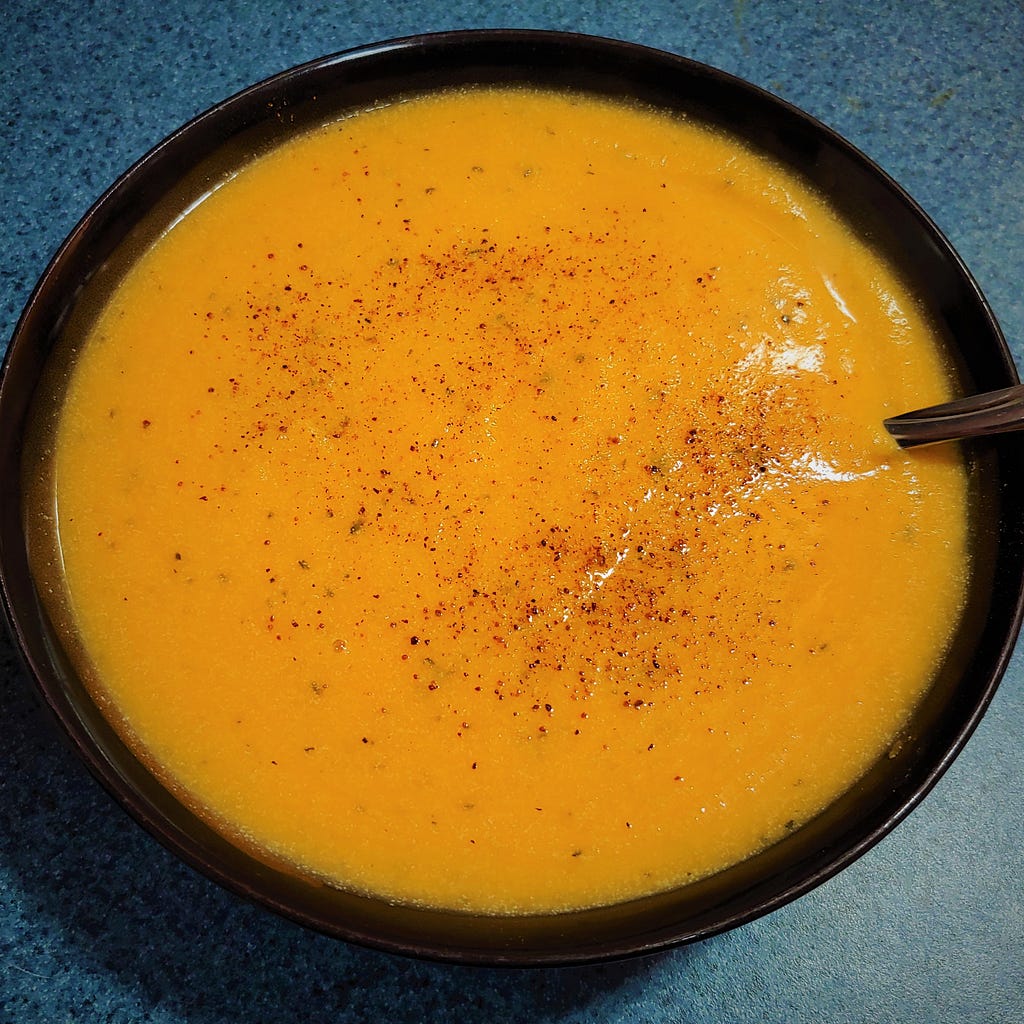 Bowl filled with sweet potato soup