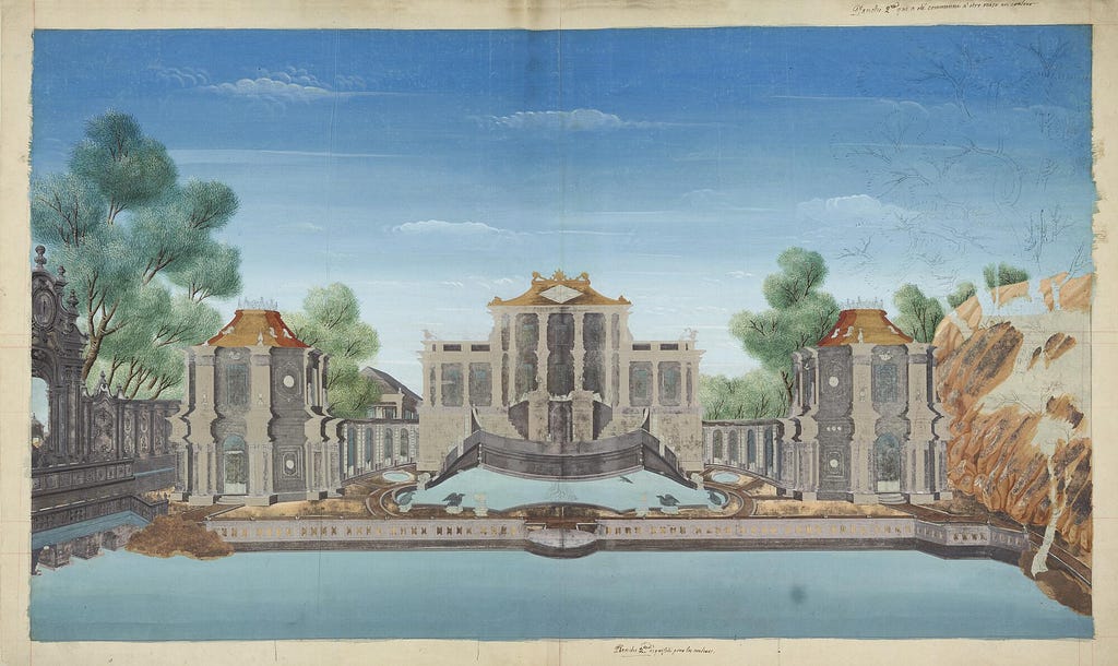 Symmetrically constructed palace façade with flanking arches and towers. Mostly shades of grey with gold roofs. Two outside staircases turn inwards behind retaining wall. Small blue pool in front of retaining wall and a larger blue pool across bottom of the image. Blue sky above, and green trees behind and to the sides of the palace.