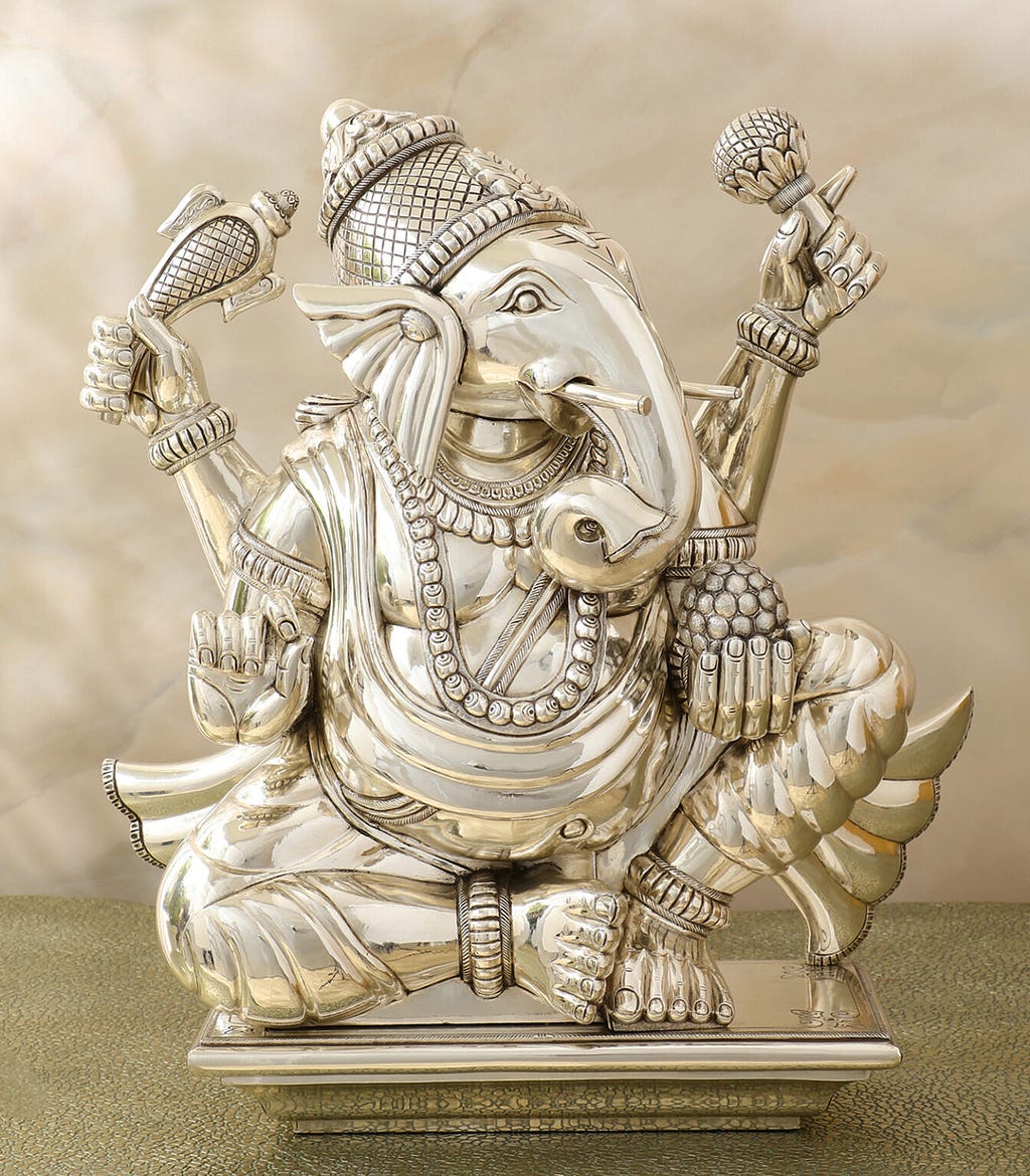 A beautifully crafted Silver Ayaan Ganesha God Idol symbolizing strength and courage, designed to provide protection and support in your spiritual journey.