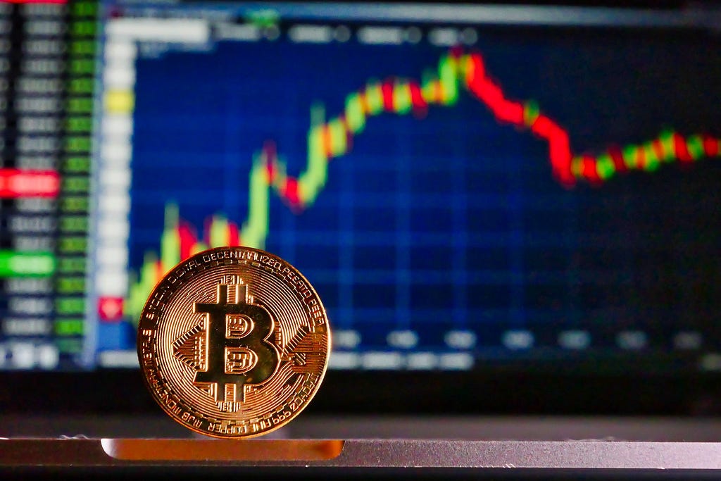 Image by Roy Buri from Pixabay — Bitcoin with chart background